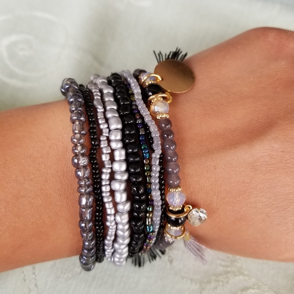 Beautiful stack beaded bracelets with tassels